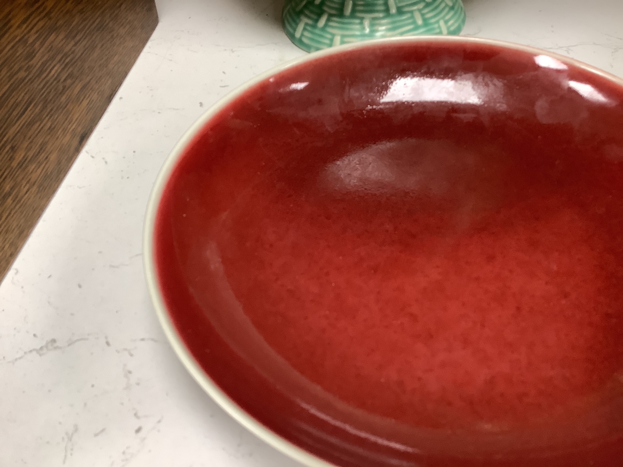 A Chinese sang de boeuf glazed dish, 22cm